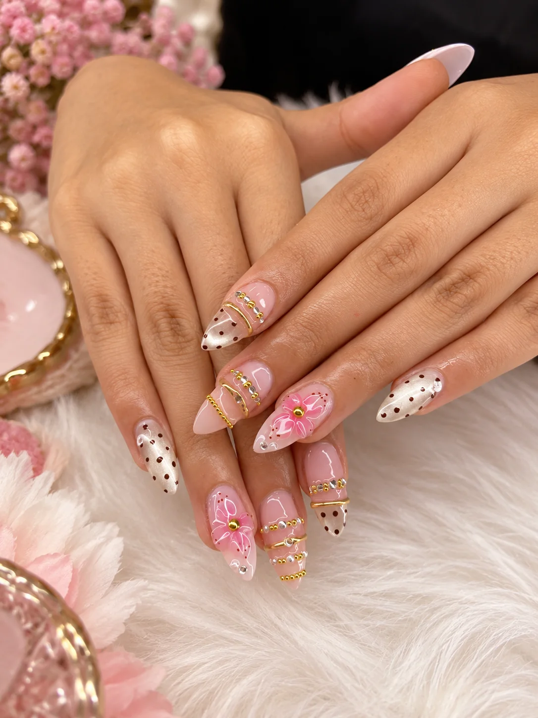 Pink floral nail art with gold detailing by Pink Petals